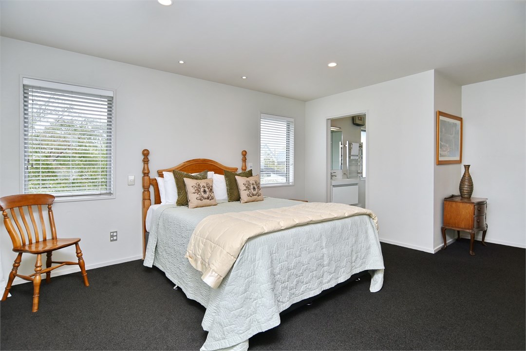 Bedroom 1 has a Queen bed and an ensuite