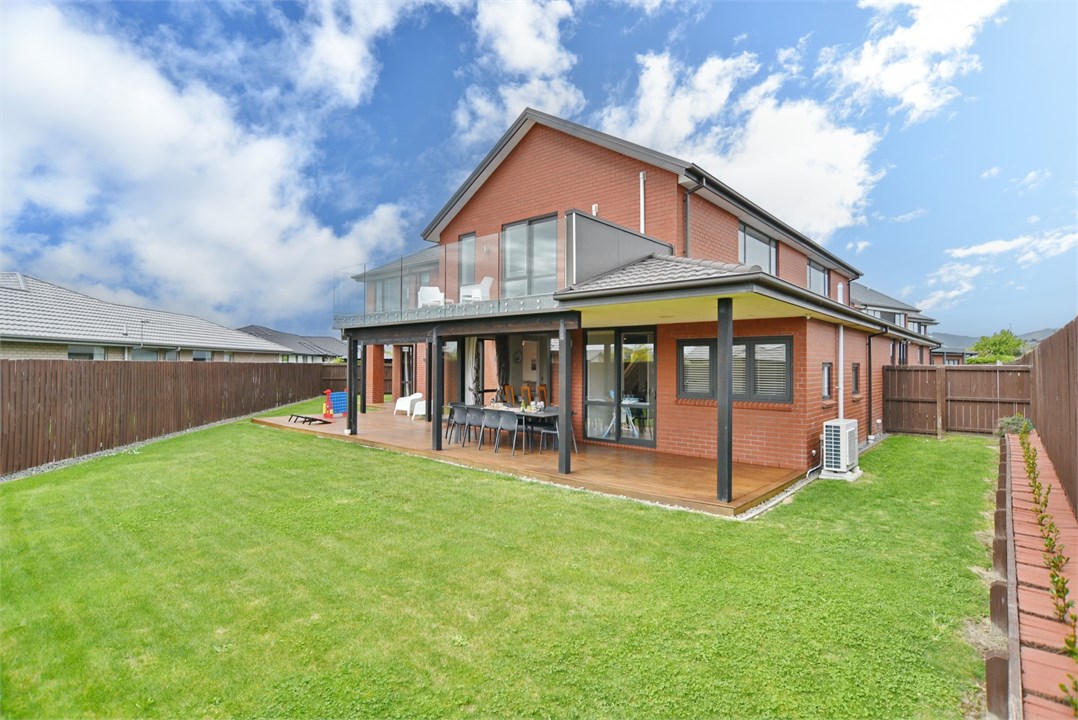 View of the property building and backyard