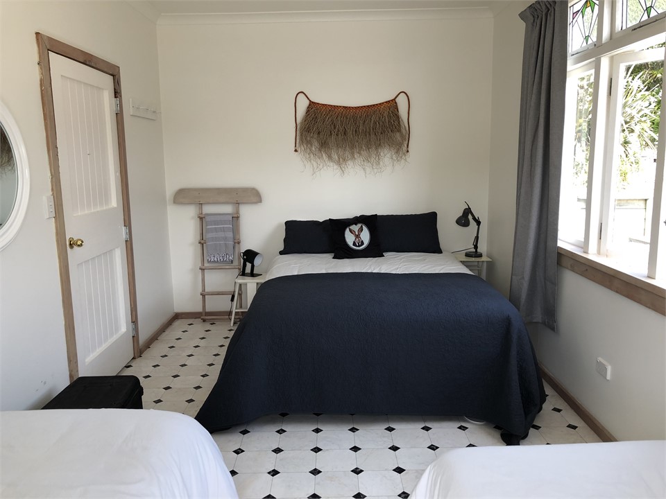 Bedroom 2 Double bedroom with 2 singles- opens to