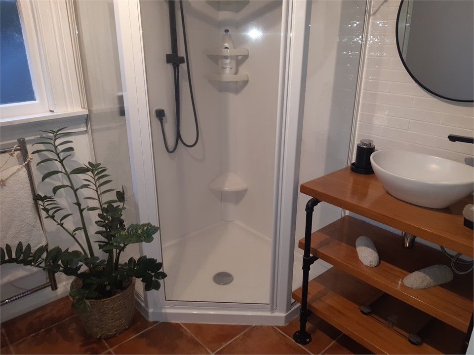 Cottage bathroom with hand-made Rimu vanity