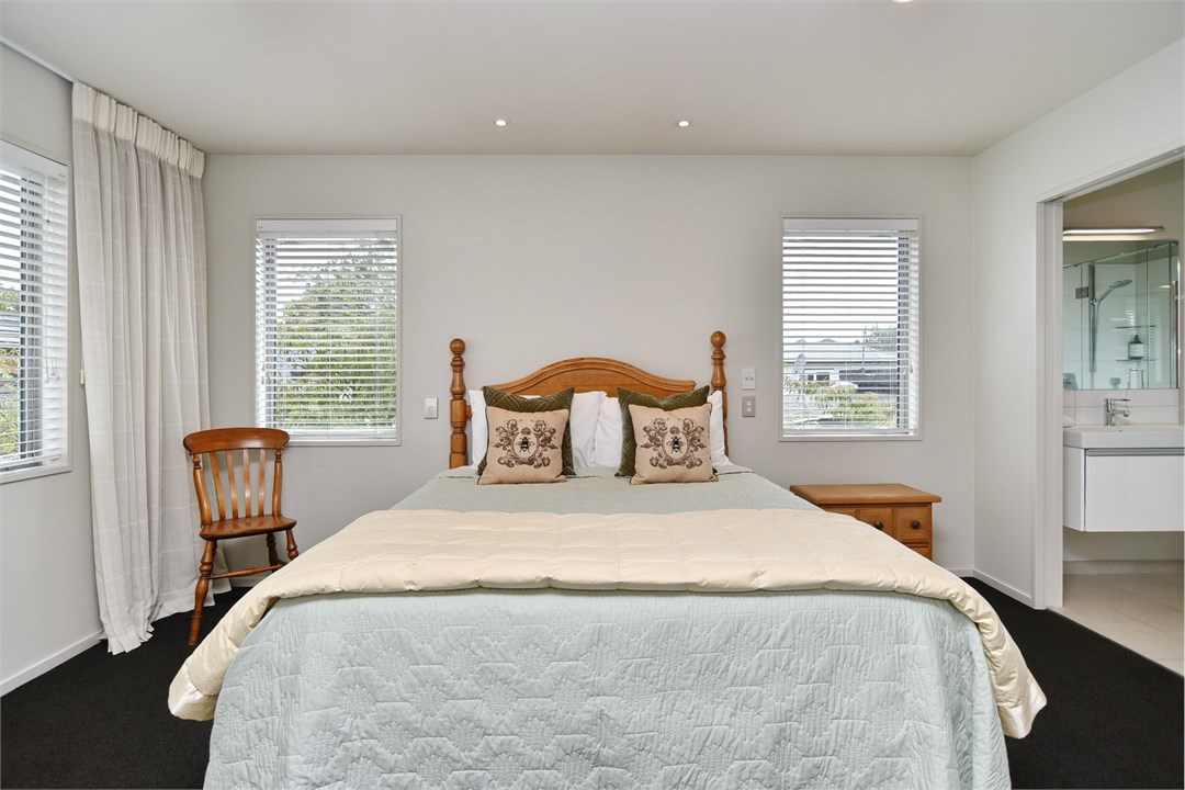 Bedroom 1 has a Queen bed and an ensuite