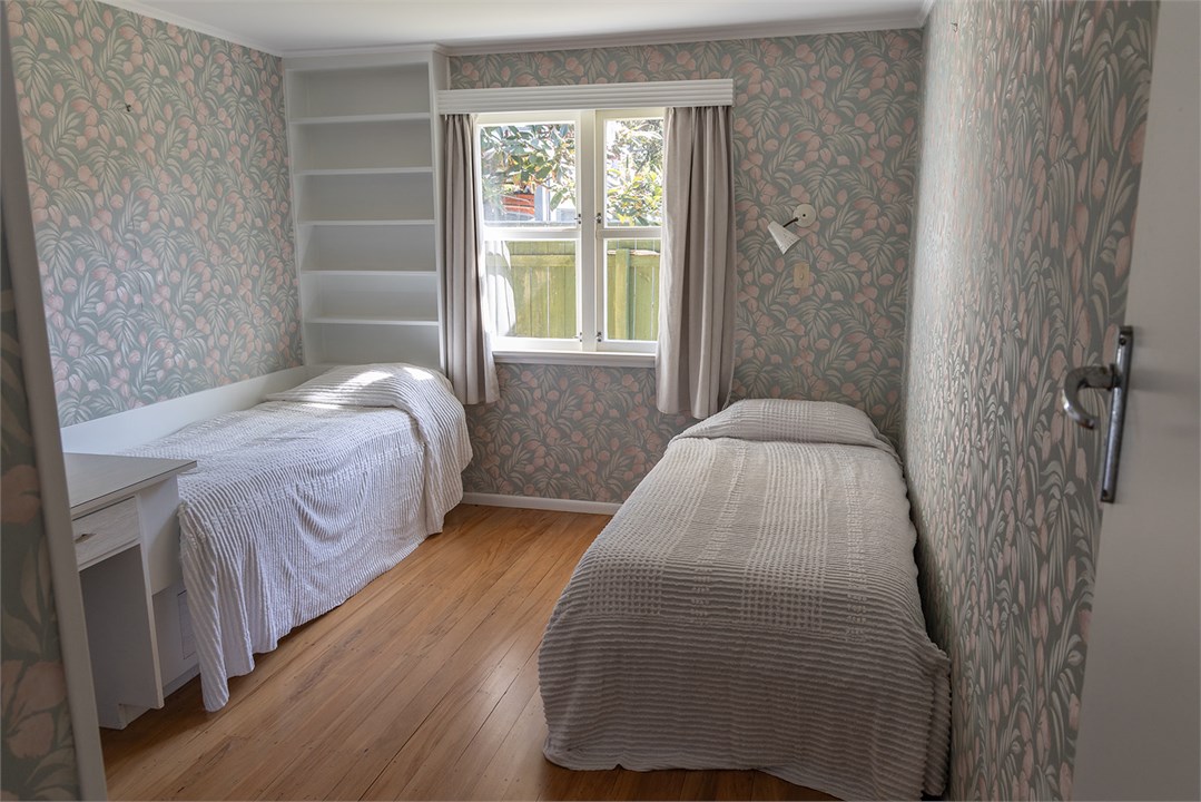 bedroom 2 with single + built in single beds