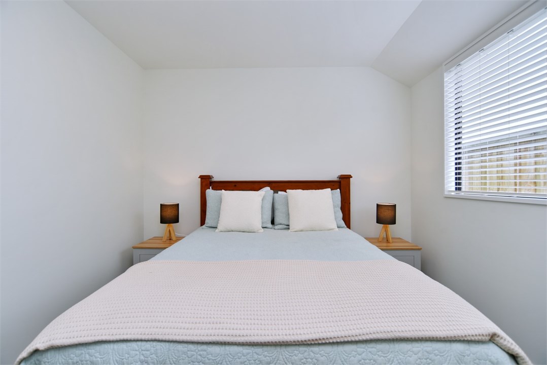 Bedroom 2 has a Queen bed