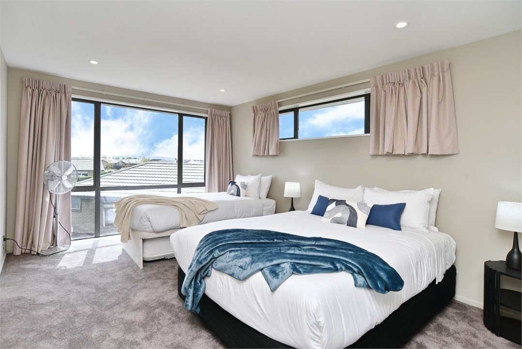 Bedroom 4 - Queen bed, Single bed, and trundler