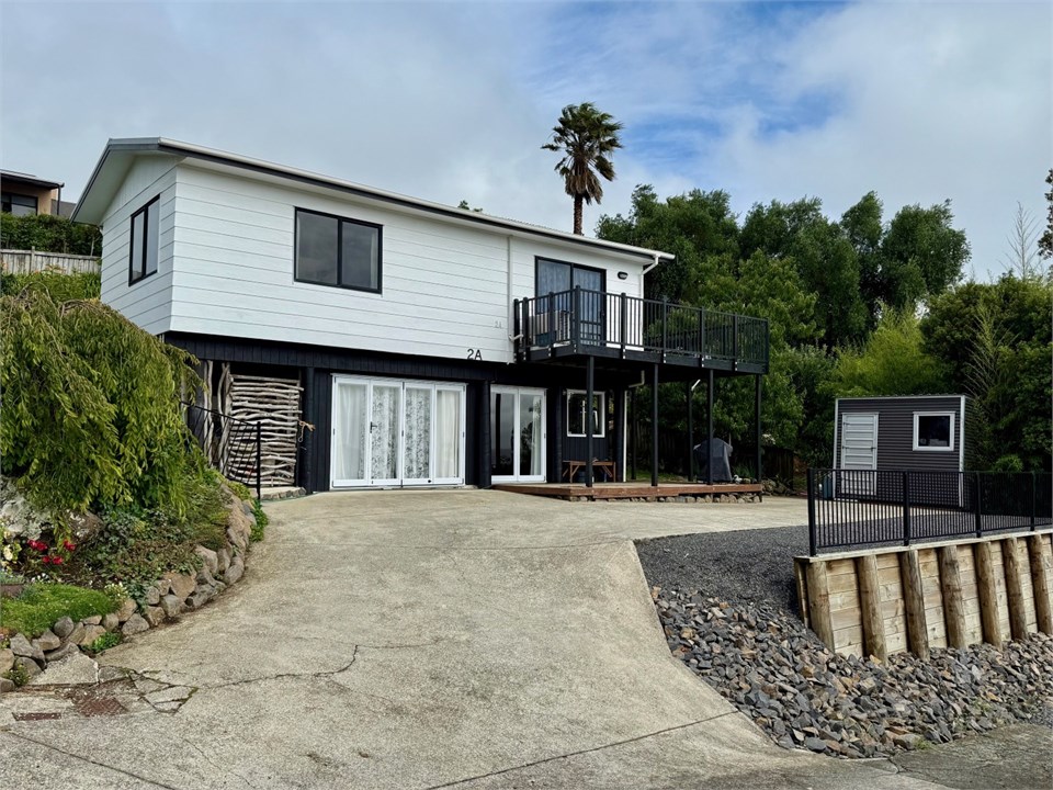 Upstairs apartment, private entry and off-street p