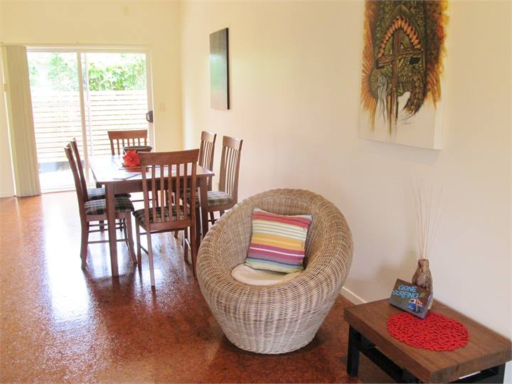 dining area leading to the rear entrance