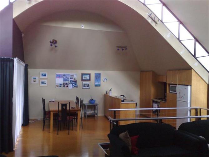 Upstairs showing kitchen & dining area