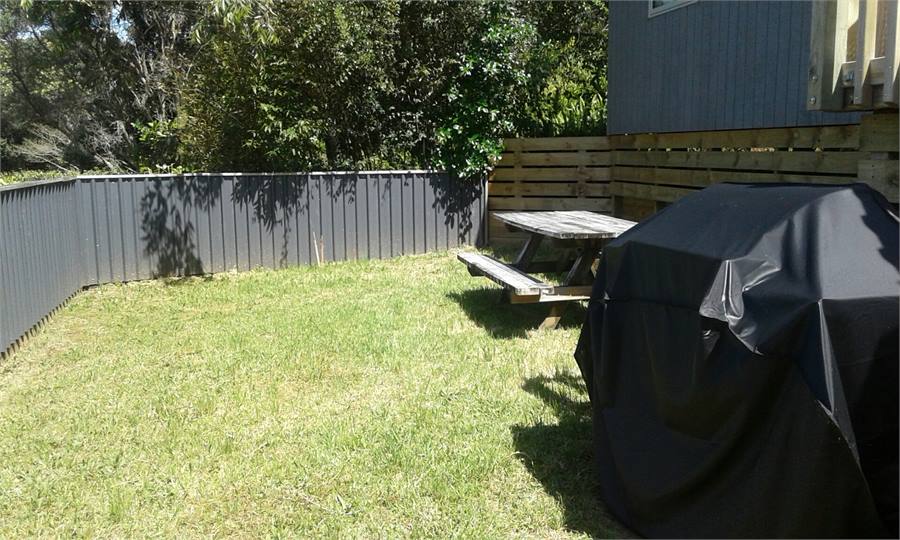 Enclosed front lawn and table