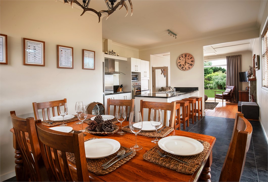 The oak dining table.