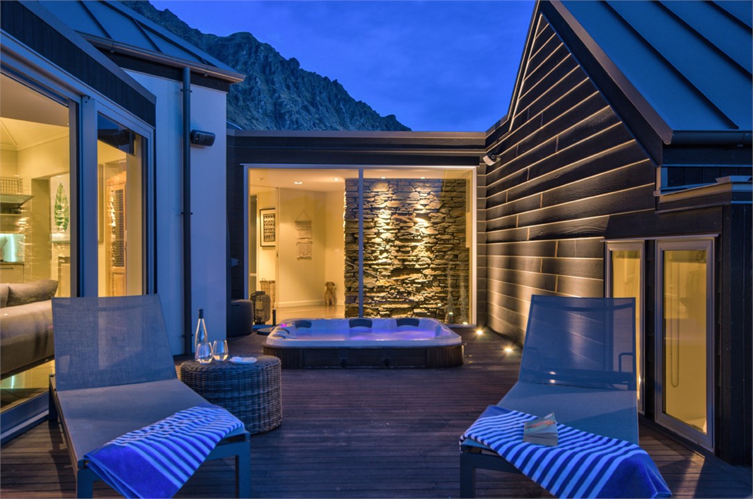 Outdoor spa area at night