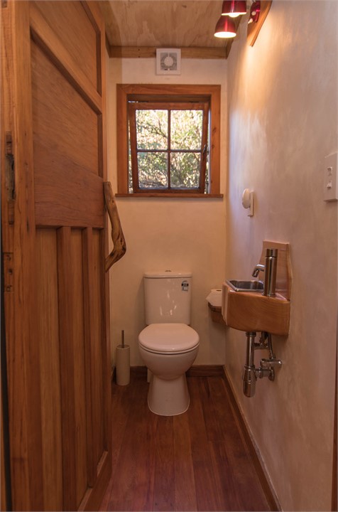 Hand crafted toilet room