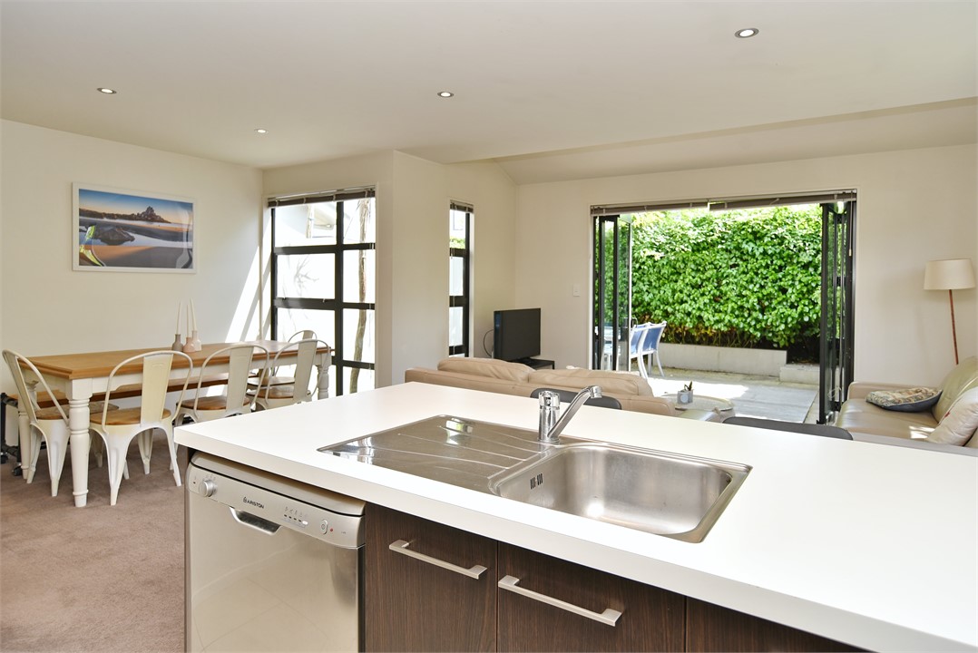 The kitchen has a lovely view of the garden.