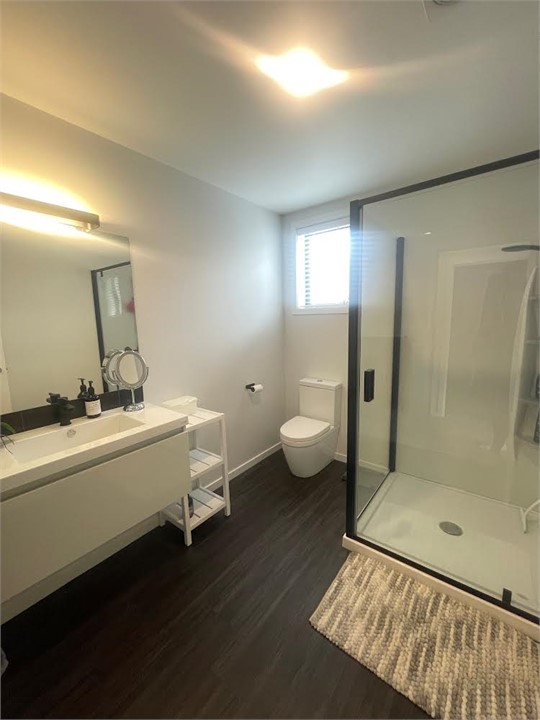 The ensuite bathroom with a large shower to cool d