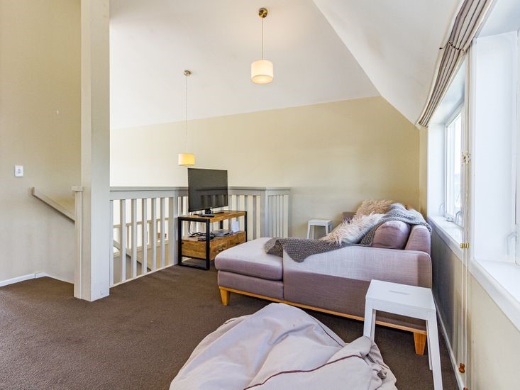 Upstairs TV and couch