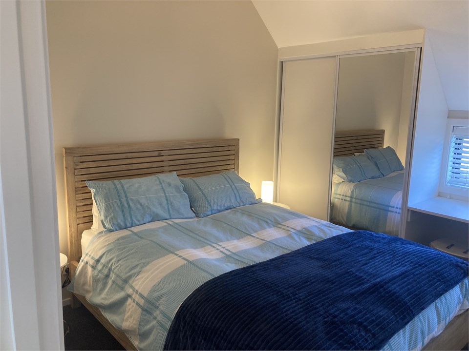 Queen bedroom with desk