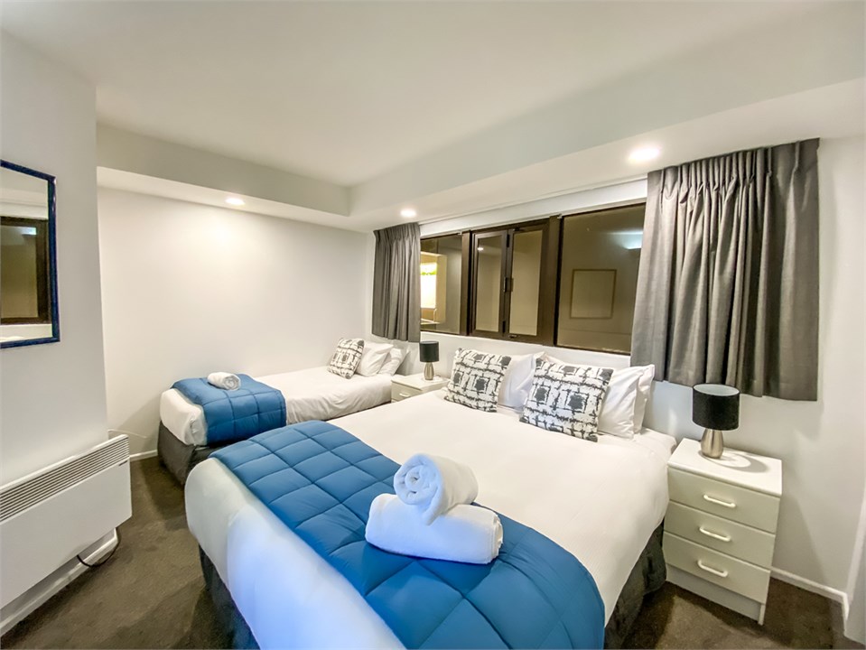 Bedroom 2 - 1 Queen & 1 Single