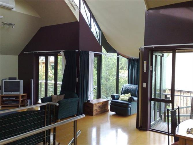 Upstairs showing reading area and lounge