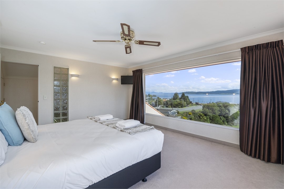 Master bedroom with lake views