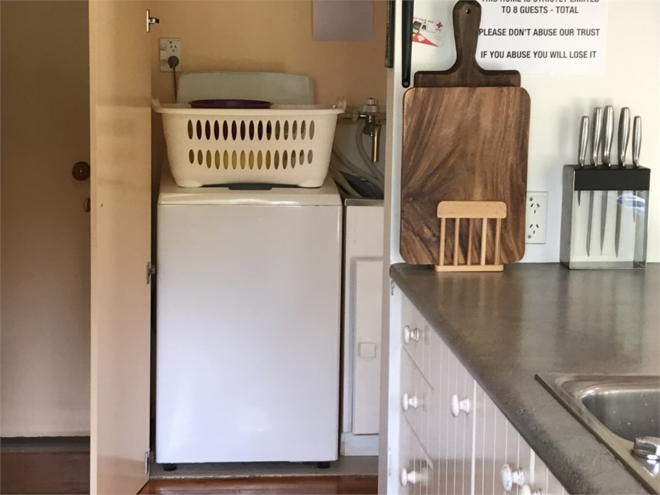 Laundry behind double doors