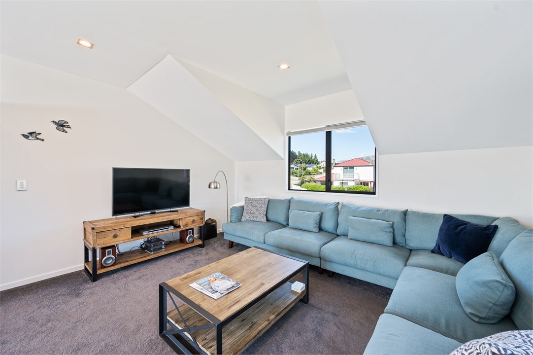 Large cosy TV space.