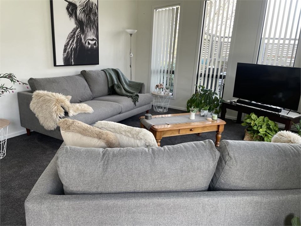 Main lounge with new lounge suite and new carpet