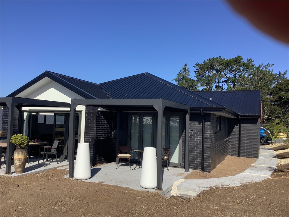 Front with outdoor dining area