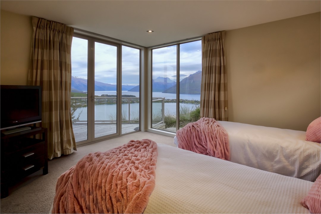 The other double bedroom on main floor, lake views