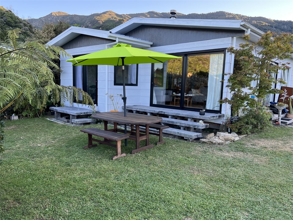 outdoor table and benches with umbrella