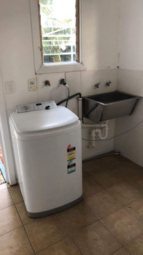 Laundry area second bathroom