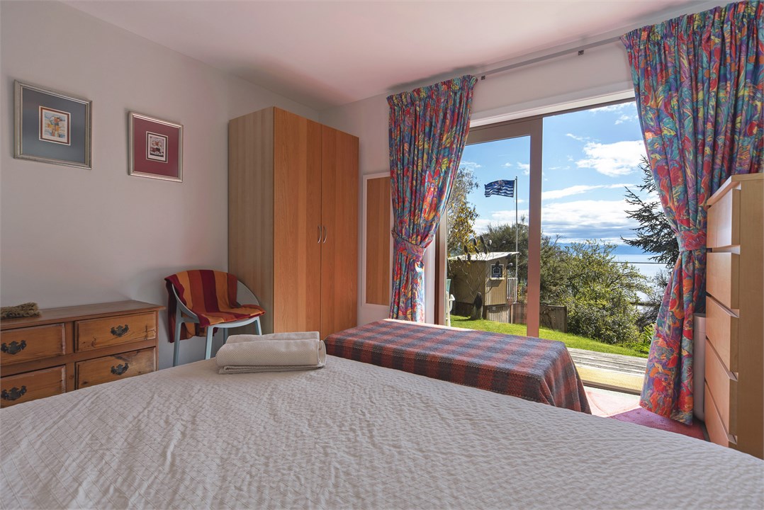 Bedroom 2 with Sea & Garden Views