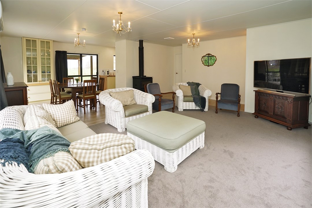 Living area has a TV and seating areas