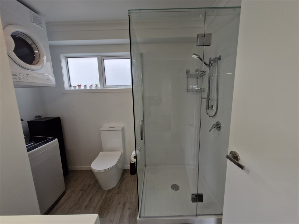 Bathroom includes Washing Machine & Dryer