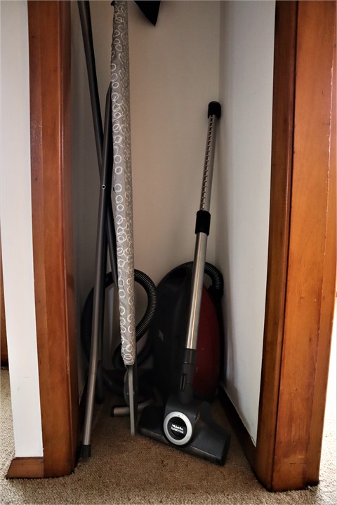 Closet with Iron, Ironing board, Vaccum Cleaner