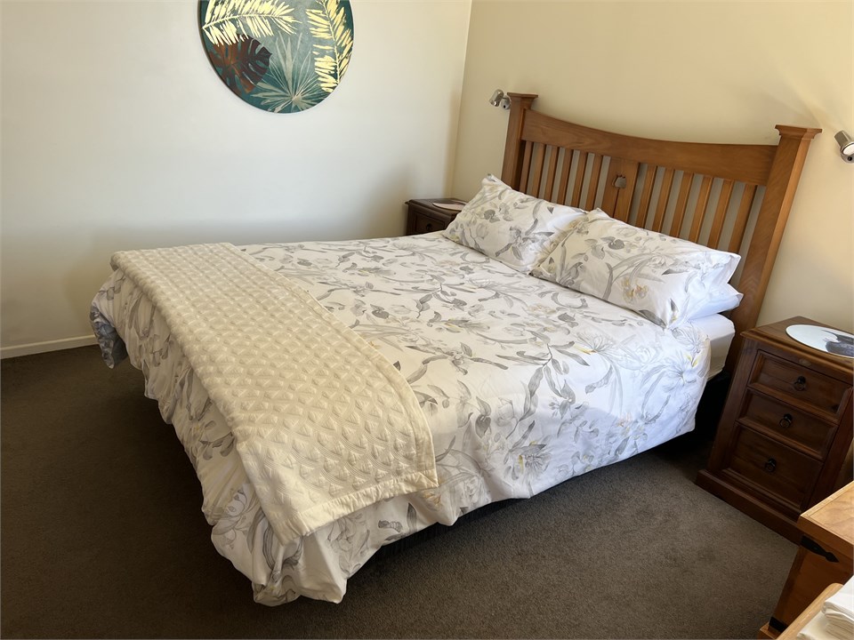 Main bedroom with comfortable queen bed.