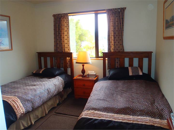 Bedroom with two singles, views over Lake Hawea