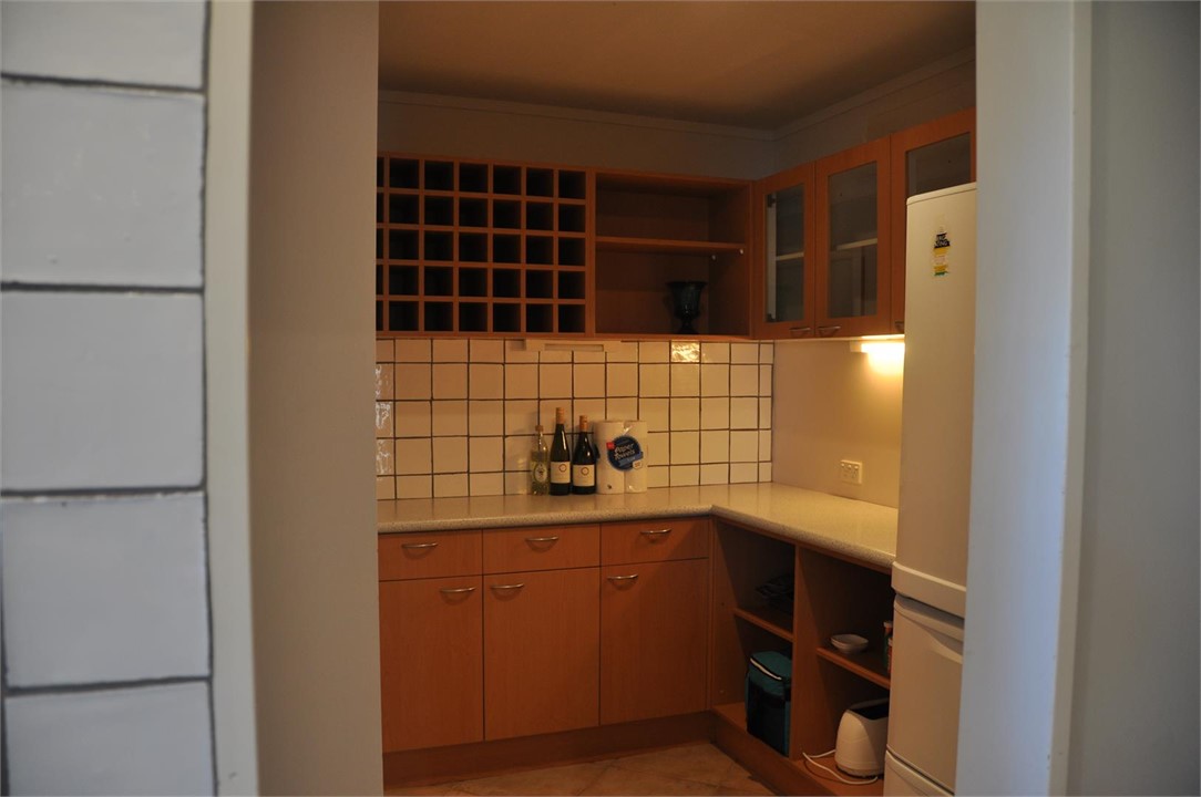 walk through pantry joins houses together 