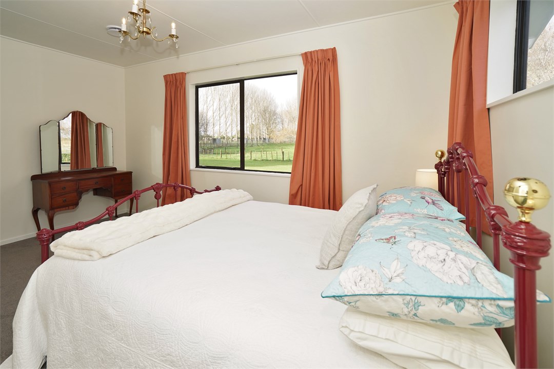 Bedroom 2 has a Queen bed