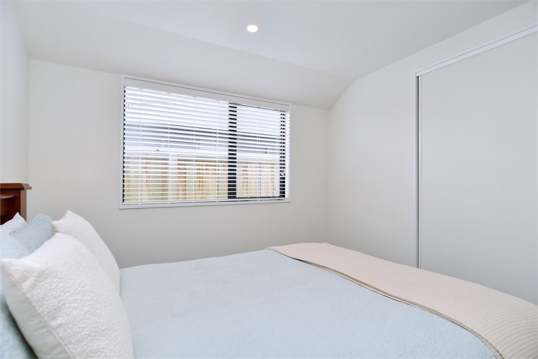 Bedroom 2 has a Queen bed