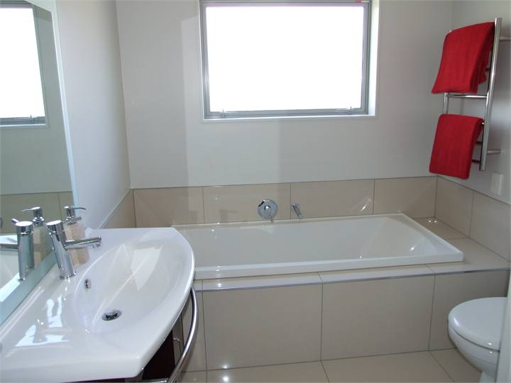 Combined shower/toilet/bath/basin