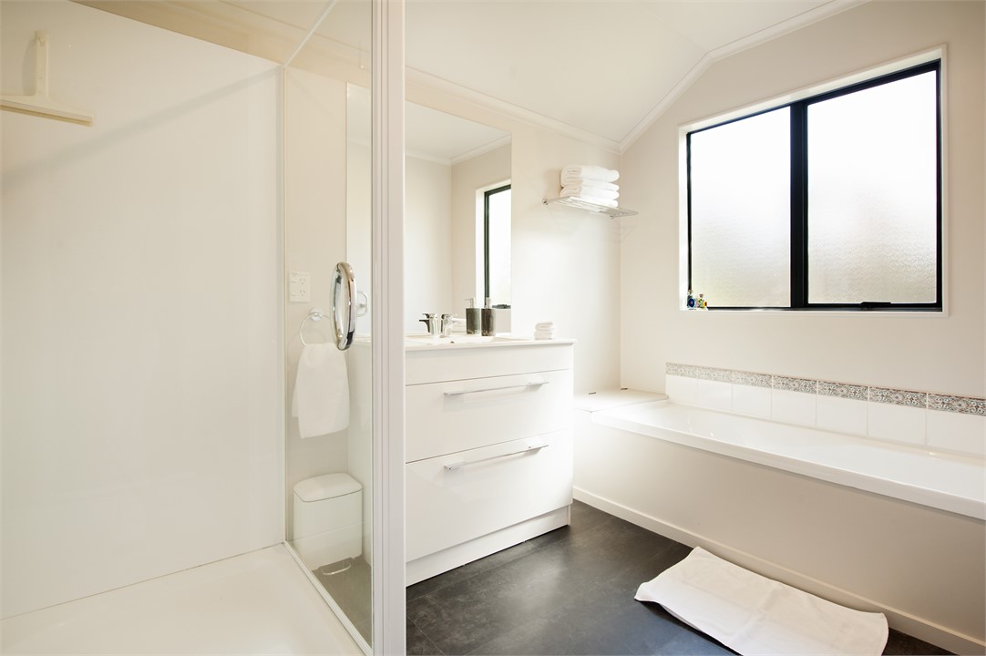 Main bathroom with Shower, Separate bath, Toilet &