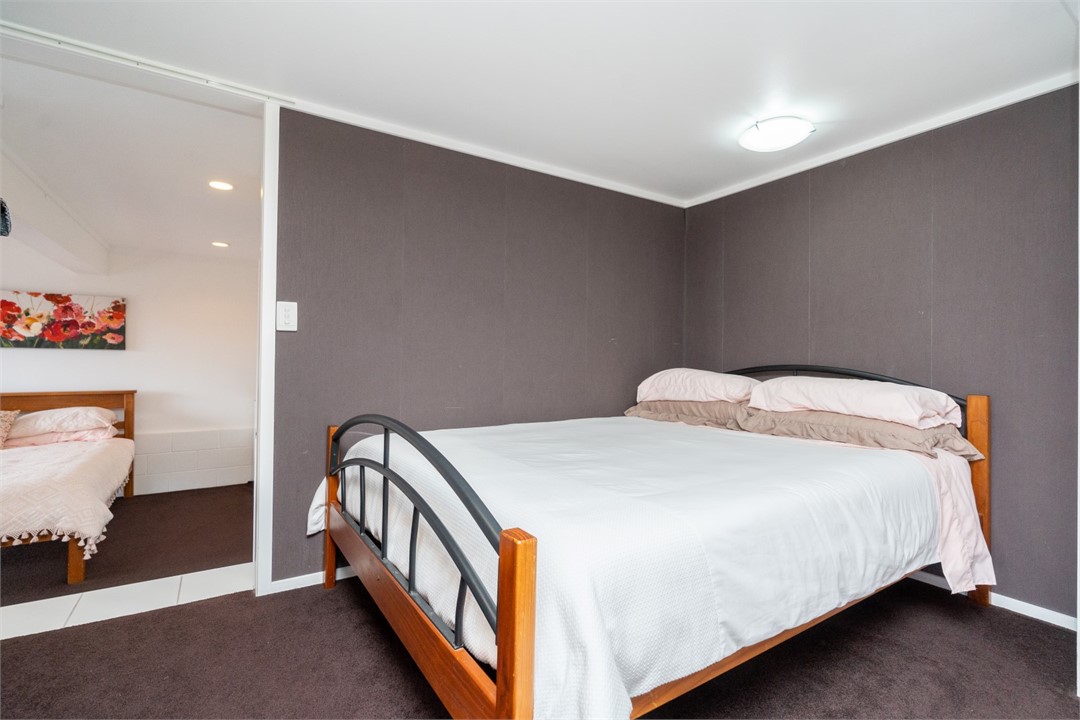 Bedroom 2 has a Queen bed