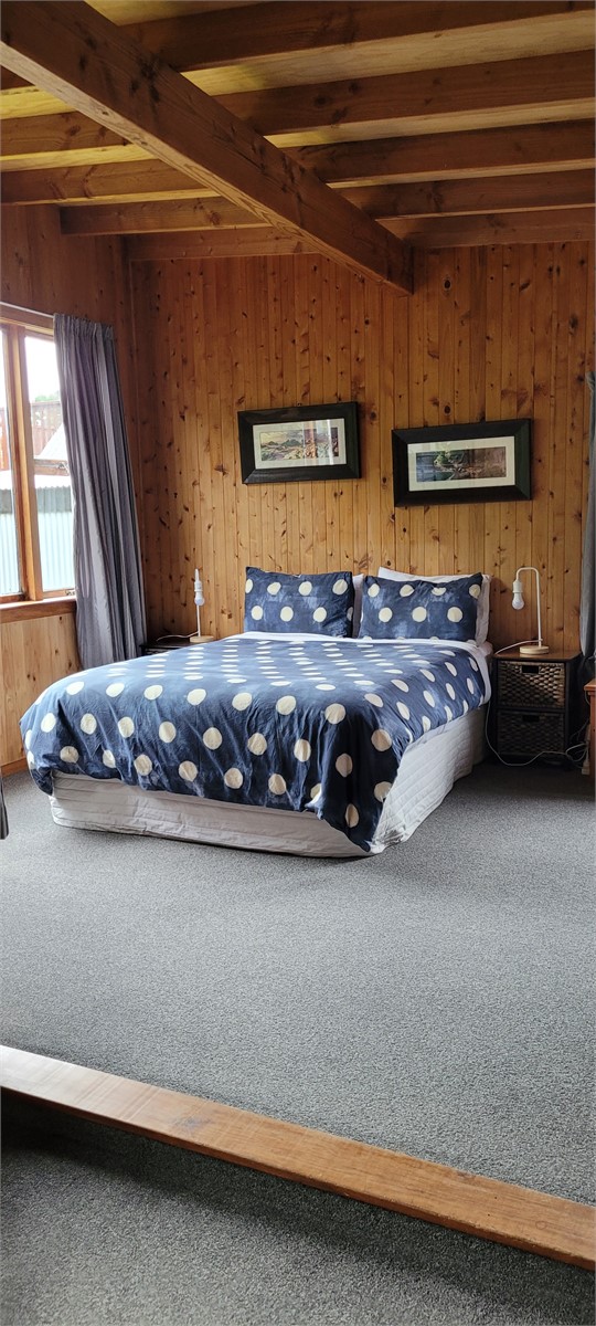 Cottage Two, queen bed off the lounge