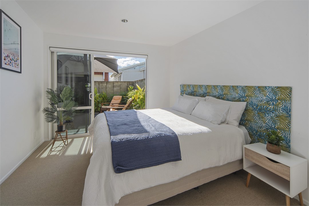 Bedroom 2 with King bed (or 2 Singles by request)