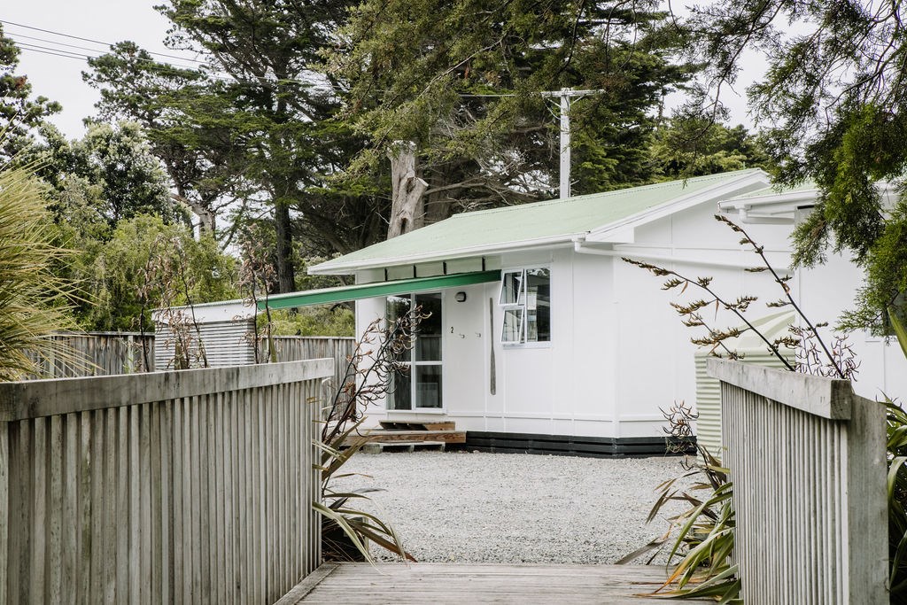 Ample parking, surrounded by trees