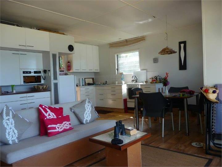 One'atea Lounge (facing water) and kitchen