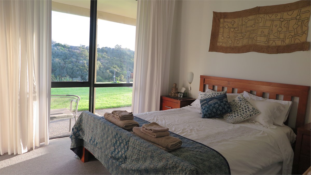 Bedroom 2 with slider door to garden