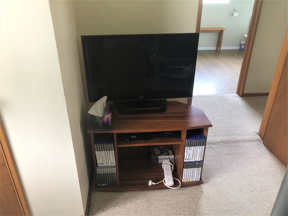 TV and playstation II games in bedroom 3