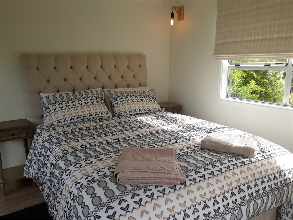 Bedroom has triple aspect views & a balcony