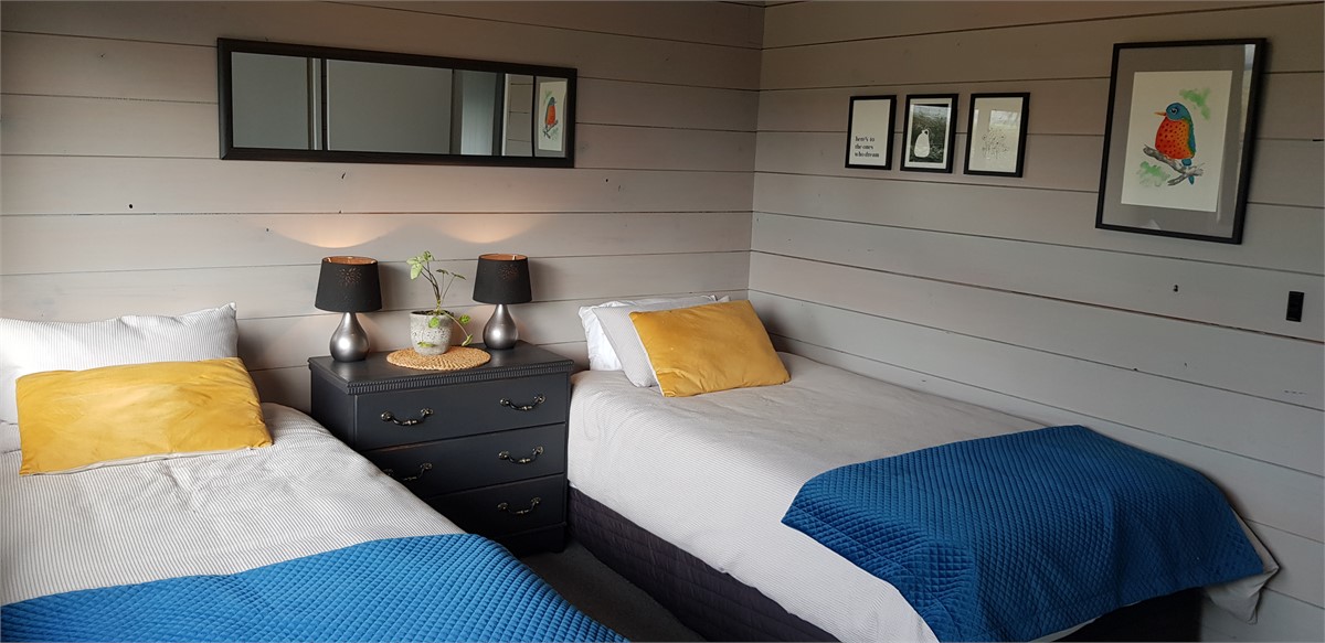 Bedroom #2 contains 2 King single beds