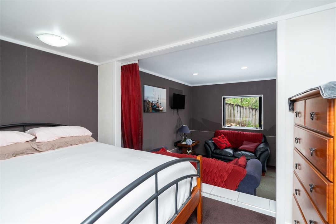 Bedroom 2 has a Queen bed